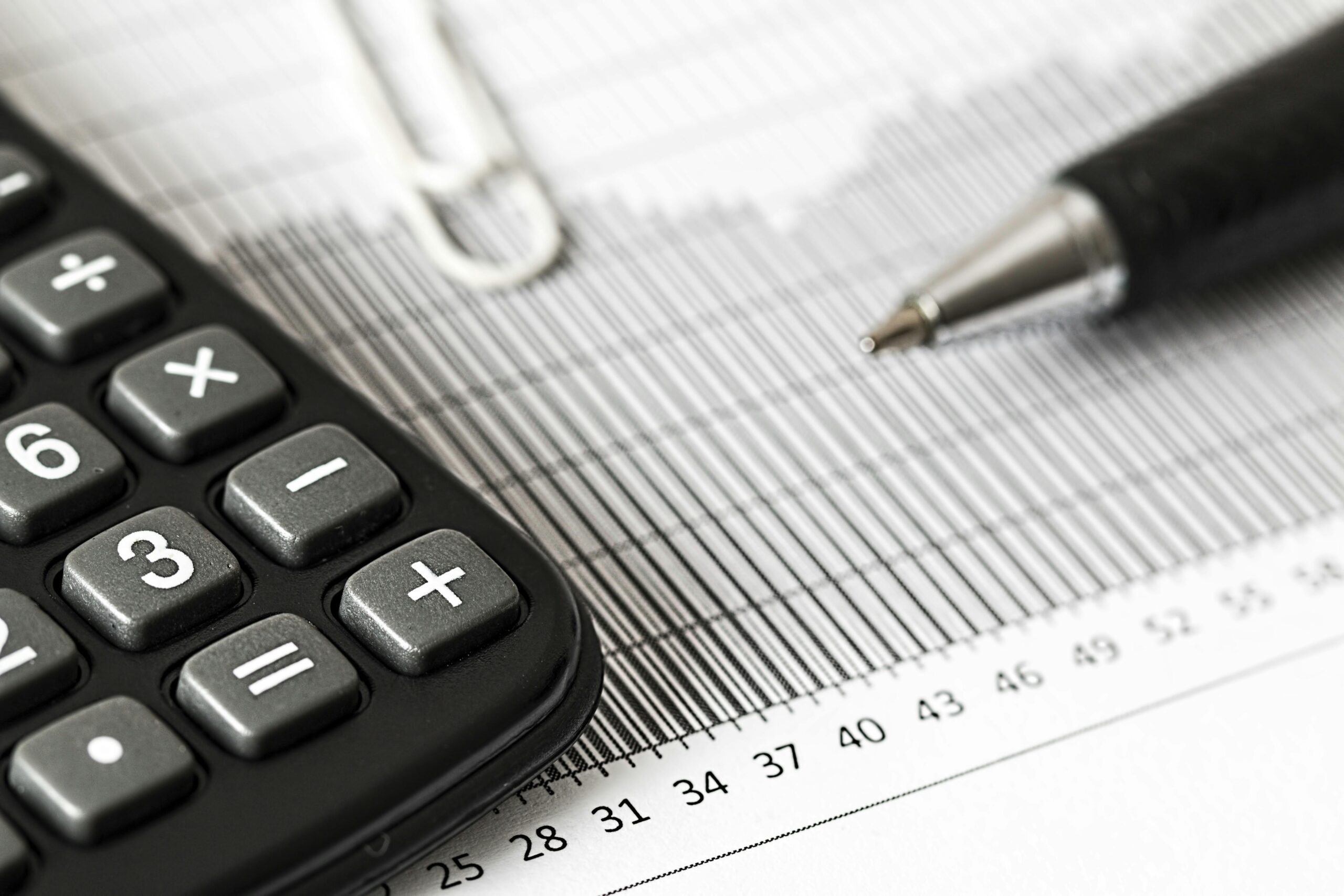 Pen and Calculator on a desk